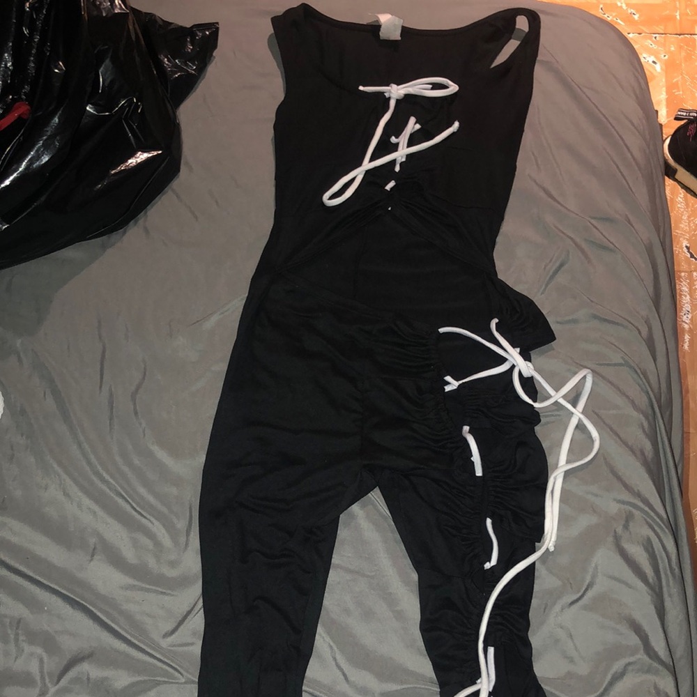 Black Jumpsuit with White Accents